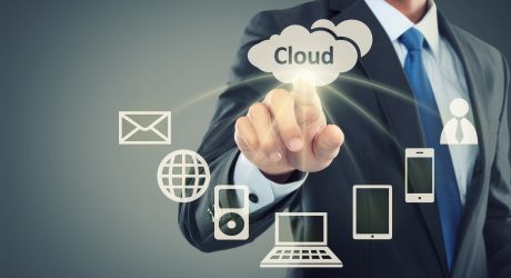 Business man pointing at cloud computing on virtual background